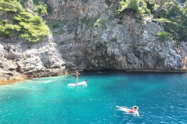 sup boarding caves swimming croatia